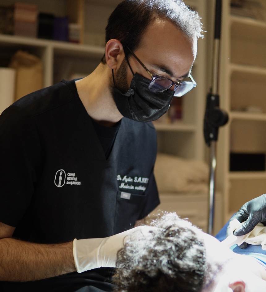 Dr Aydin Sanavi pendant une intervention de greffe capillaire à Bordeaux